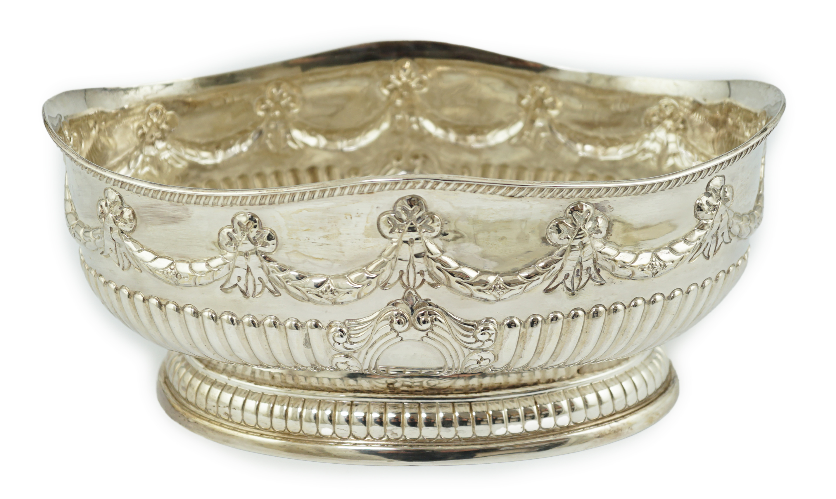 A late Victorian demi-fluted silver oval fruit bowl, by Martin, Hall & Co